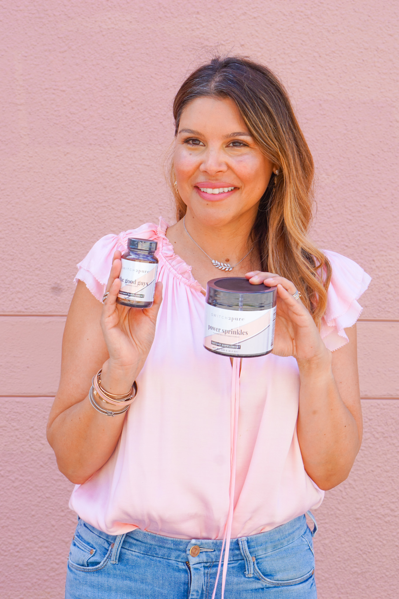 Switch2pure founder Estela Cockrell with multivitamin power sprinkles and probiotics